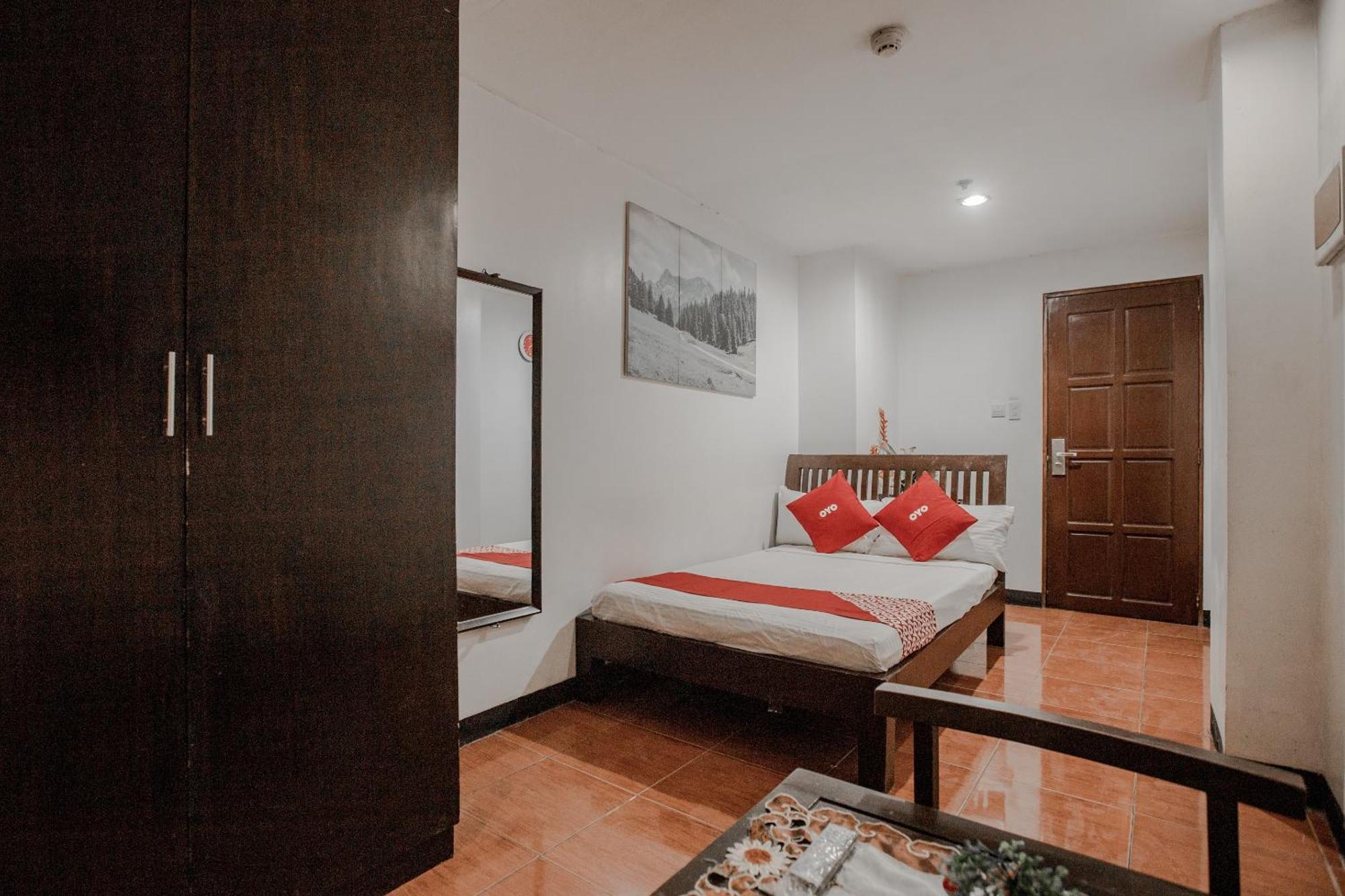 OYO 714 Haeinsa Condotel Cidade Quezon Exterior foto