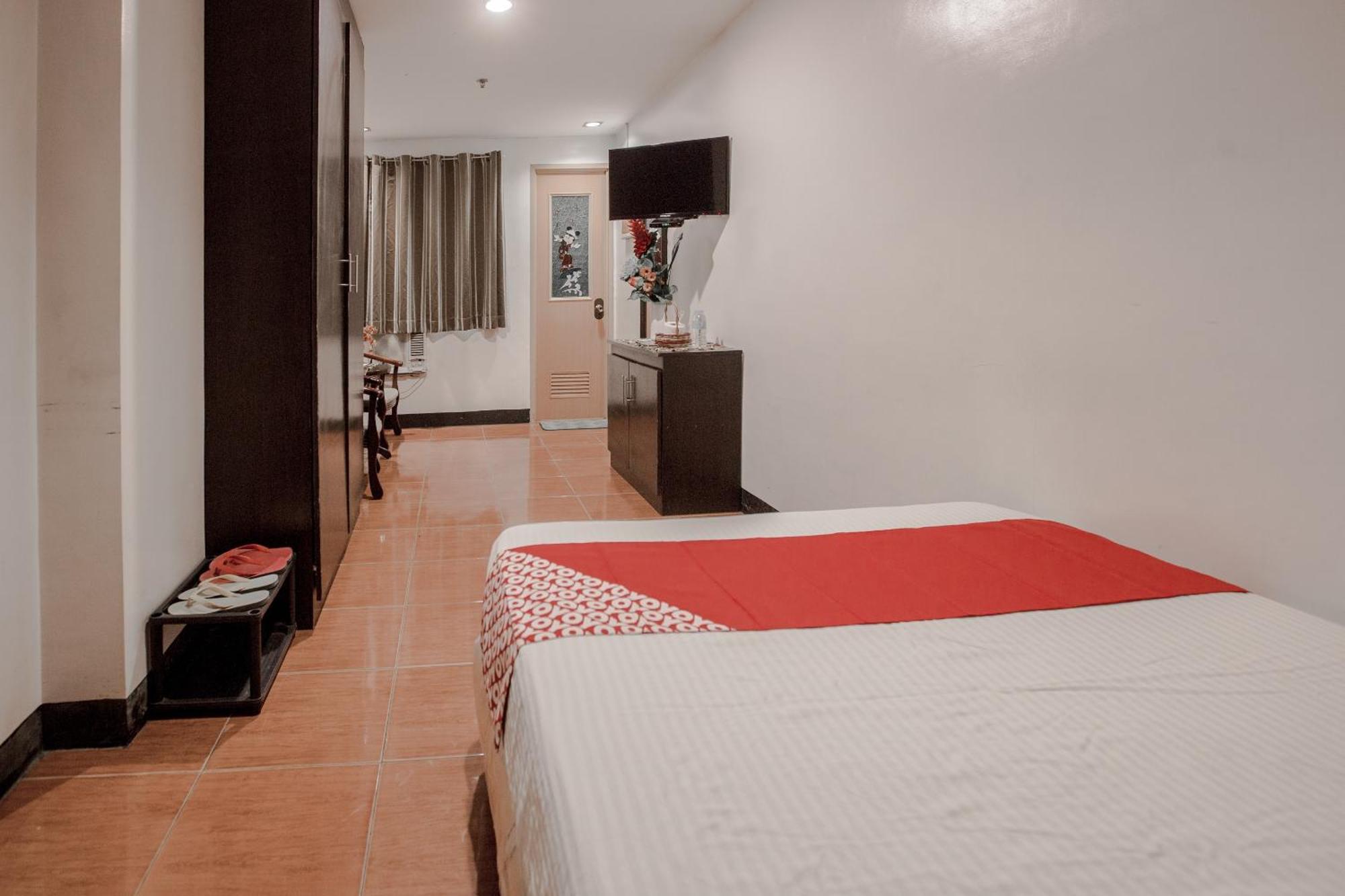 OYO 714 Haeinsa Condotel Cidade Quezon Exterior foto
